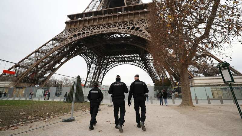 Police patrol near the Eiffel Tower in Paris (Image: Xinhua/REX/Shutterstock)