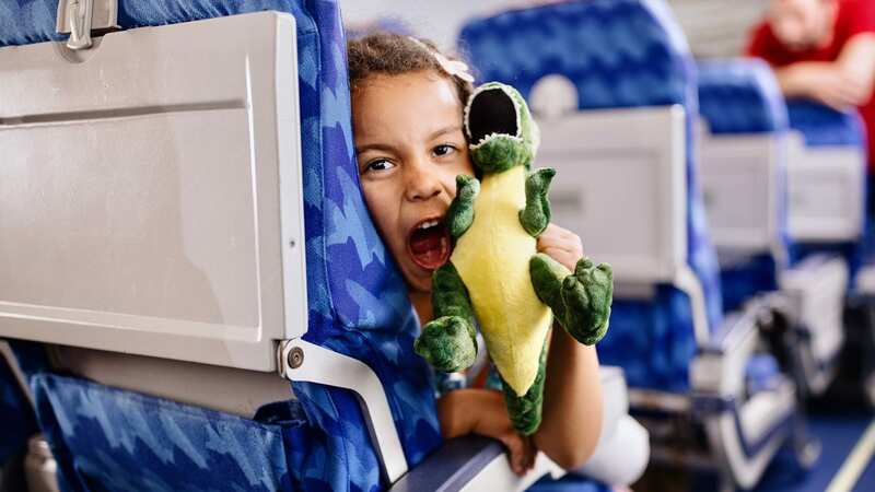 One mum has a simple trick to help make travelling with kids a little easier (Image: Getty Images)