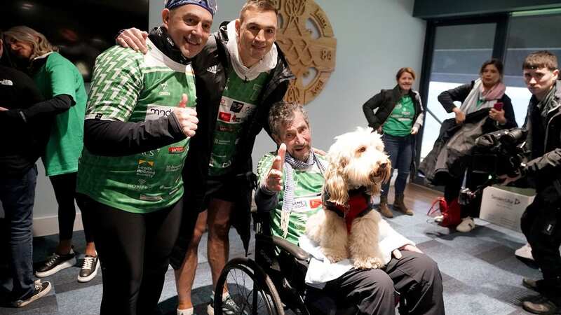 Kevin Sinfield meets TE presenter Charlie Bird, dog Tiger and Martin Watson Croft at Croke Park on day five of 7 in 7 in 7 Challenge in Dublin (Image: PA Wire/PA Images)