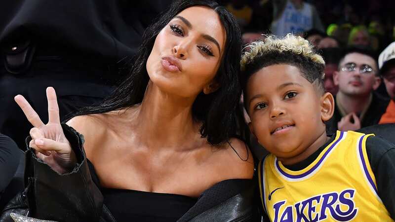 Kim posed courtside with Saint