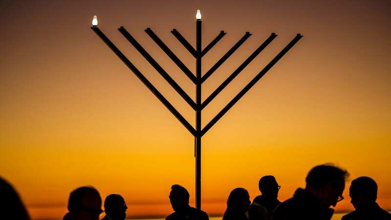 A Hanukkah menorah will now be put up in a town centre following initial fears about anti-Semitic attacks, a council has decided (Image: AP)