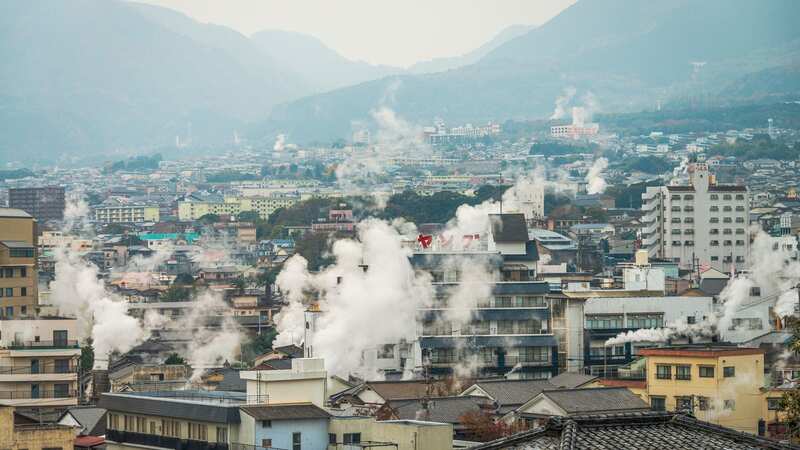 Steam rises up from the thermal springs throughout the city of Beppu in Japan (Image: Getty Images)