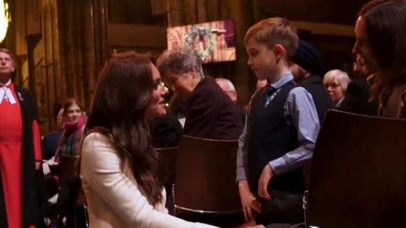 Kate Middleton seen smiling and high fiving kids at Christmas concert