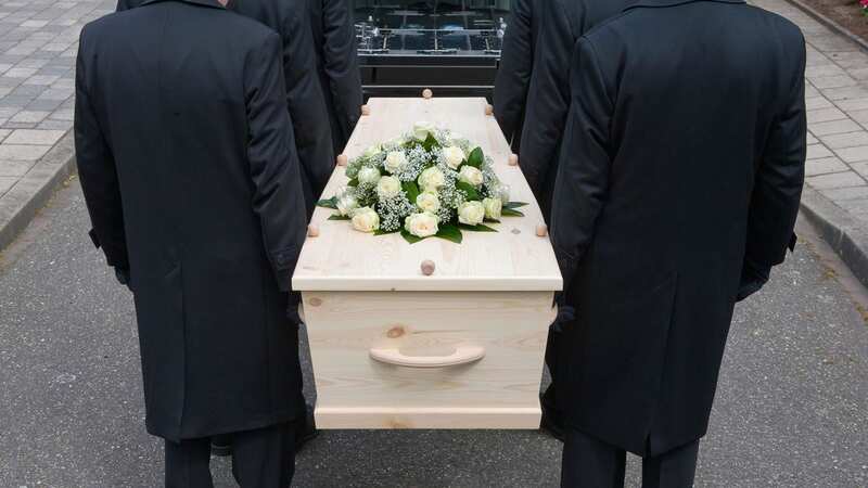 Bearers carry a coffin ahead of a service (file image) (Image: Getty Images/iStockphoto)