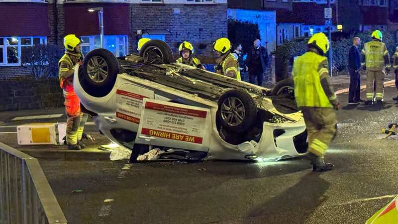 Miracle moment baby trapped inside wreckage of toppled car after crash is freed