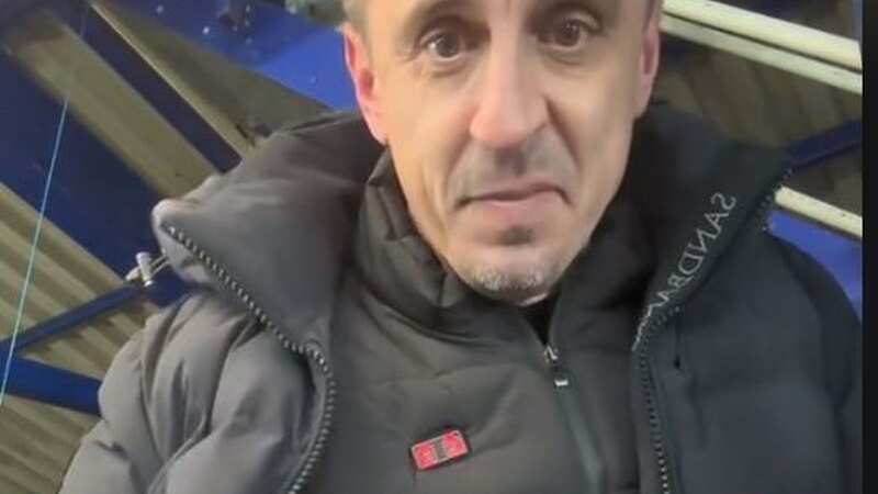Gary tries on the heated gilet ahead of media duties at the game (Image: Tiktok/Gary Neville)