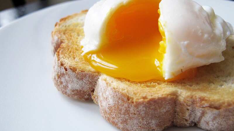 Poached eggs are a flavour explosion when done correctly (Image: Getty Images)