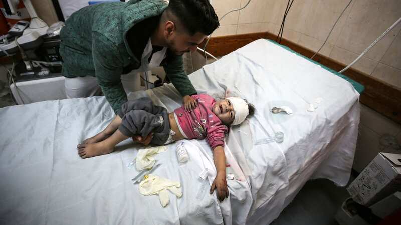 Wounded Palestinians at a hospital in central Gaza (Image: Majdi Fathi/NurPhoto/REX/Shutterstock)