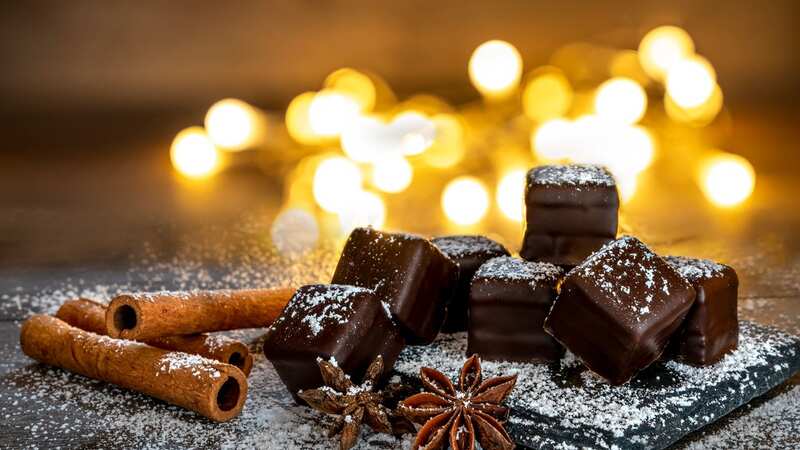 Make their day with a Christmas hamper filled with tasty treats (Image: Getty)
