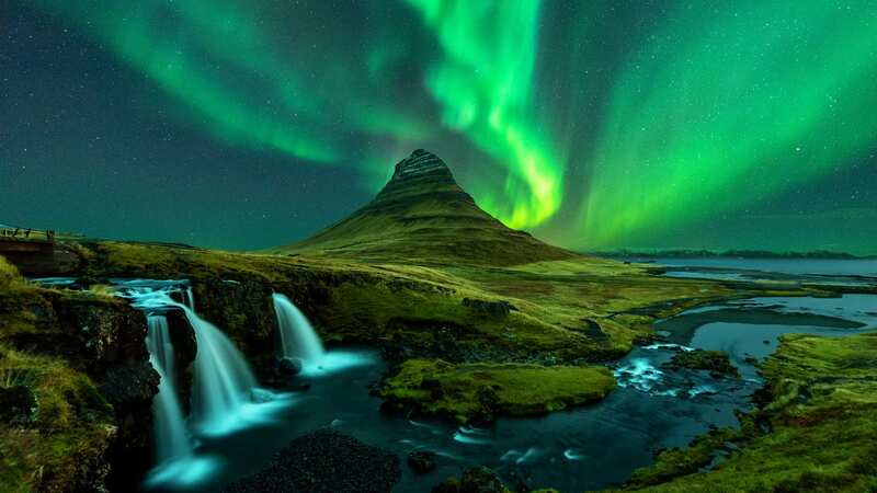 You could be lucky enough to capture the Northern Lights over Mount Kirkjufell (Image: Getty)