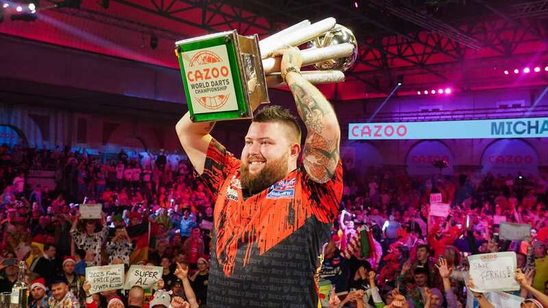 Darts champ Michael Smith strikes up unlikely friendship with football legend