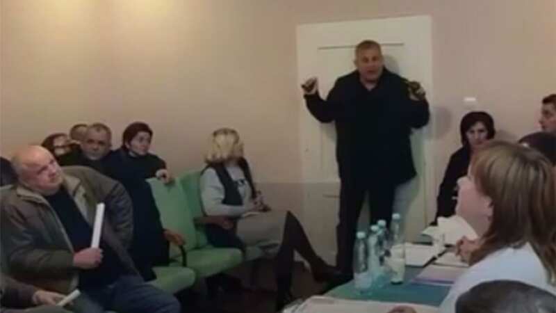 Terrifying moment rogue Ukrainian politician tosses grenade into council meeting