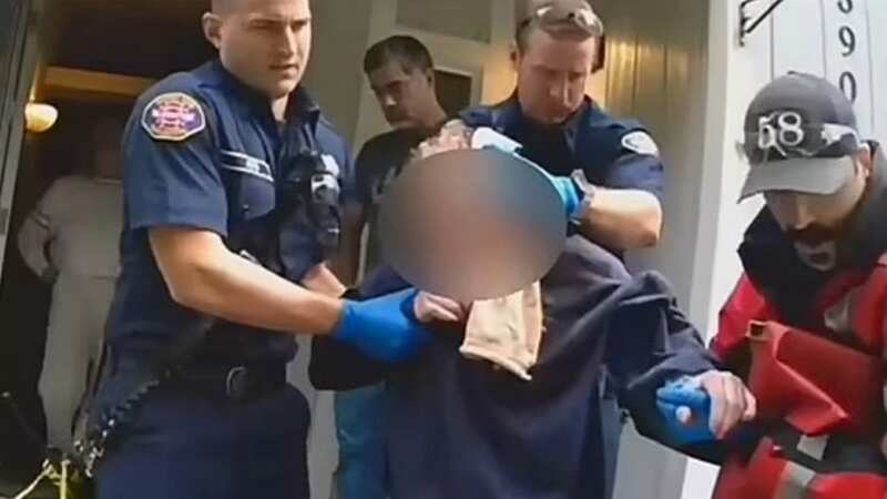 Dramatic moment bloodied woman rescued after escaping from her kidnapper