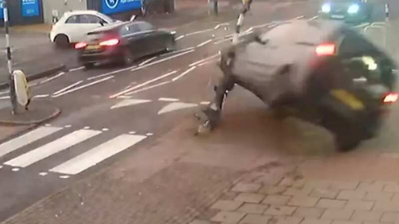 Heart-stopping moment car flips and misses mum pushing baby in pram by inches