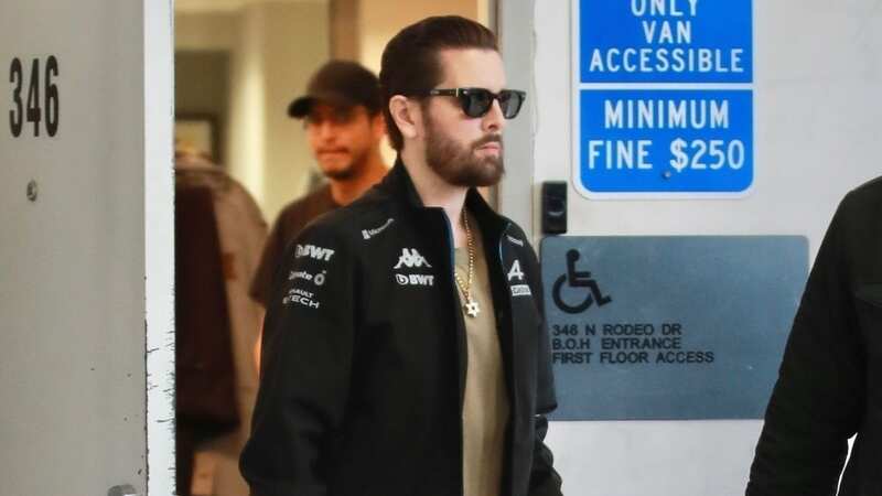 Scott Disick shows off slim figure on shopping spree with mystery woman (Image: LESE / BACKGRID)