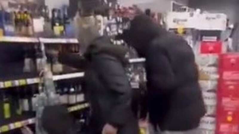 The thieves brazenly robbed alcohol from the Tesco store (Image: CrimeLdn)