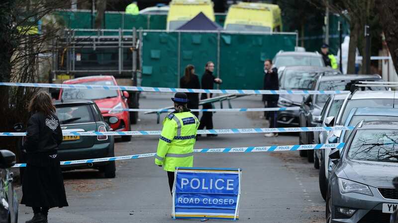 Police are pictured behind the large cordon in Brighton today (Image: Adam Gerrard / Daily Mirror)