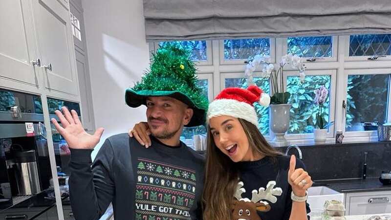 Peter Andre poses with pregnant wife Emily as they share first bump photo