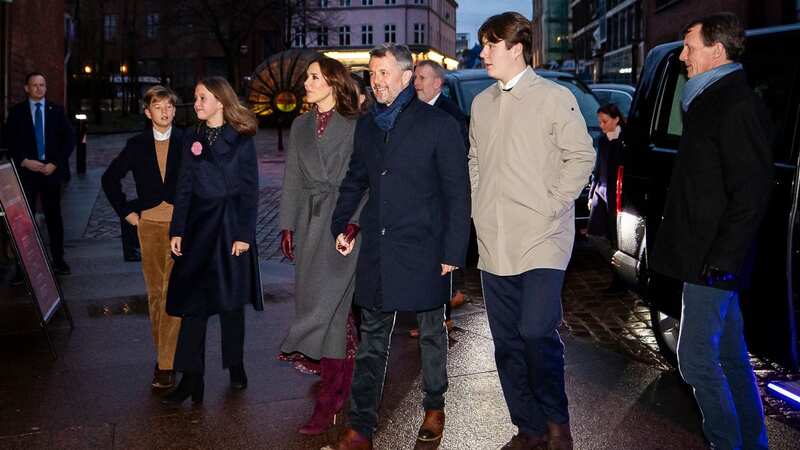 Crown Prince Frederik and Crown Princess Mary leave the Christmas Eve service in Aarhus Cathedral (Image: Ritzau Scanpix/AFP via Getty Ima)