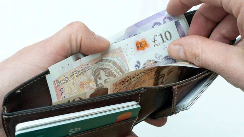 Brits have slashed their non-essential spending by more than 40% this year, compared to 2022 (Image: SWNS)