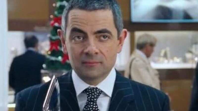 Love Actually fans just realising why Rowan Atkinson took ages to wrap present