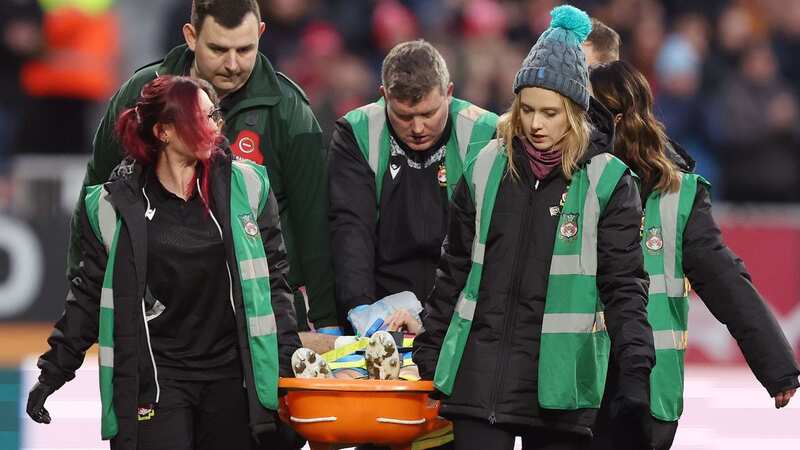 David Worrall had to be stretchered off after suffering a head injury (Image: Paul Greenwood/REX/Shutterstock)