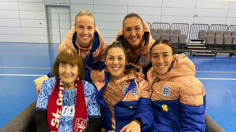 Lyn Fleming, 100, was surprised last year with a custom England t-shirt with her age and name on the back (Image: Caters News Agency)
