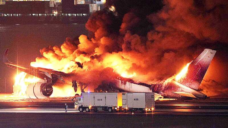 Miracle saw 379 passengers escape burning plane as slides and PA system failed