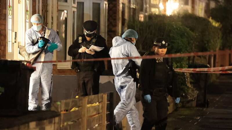Forensics at the scene outside a house in Lewisham following the death of a woman in her early 30s (Image: Marcin Nowak/LNP)