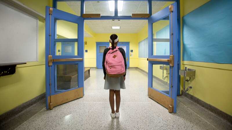She ends up being bullied as a result of the teacher