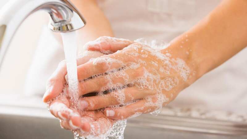 They are wondering how they can ask their mother-in-law to start washing her hands (Image: Getty Images/Tetra images RF)