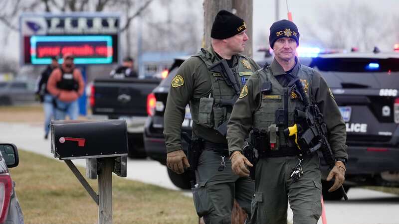 Fears multiple hurt as cops swoop on high school over active shooter - recap