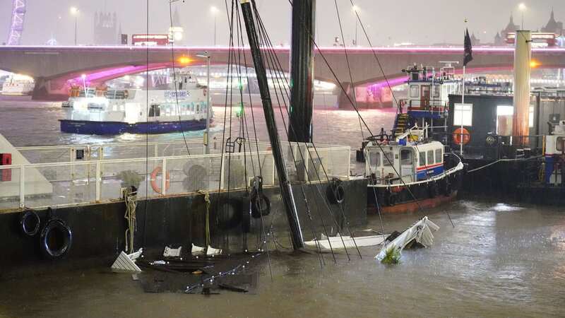 The mast of the Bar & Co boat, which was moored at Temple Pier juts from the water after the London party boat sank in the River Thames (Image: PA)