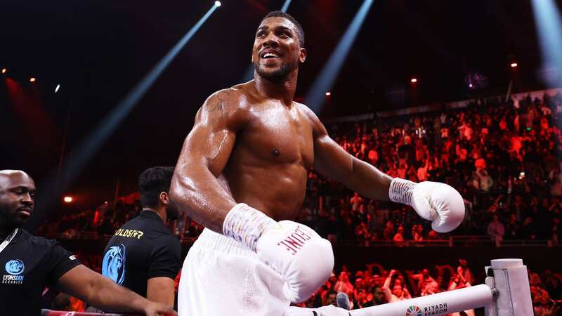 Anthony Joshua celebrates his victory over Otto Wallin in Saudi Arabia (Image: Getty)