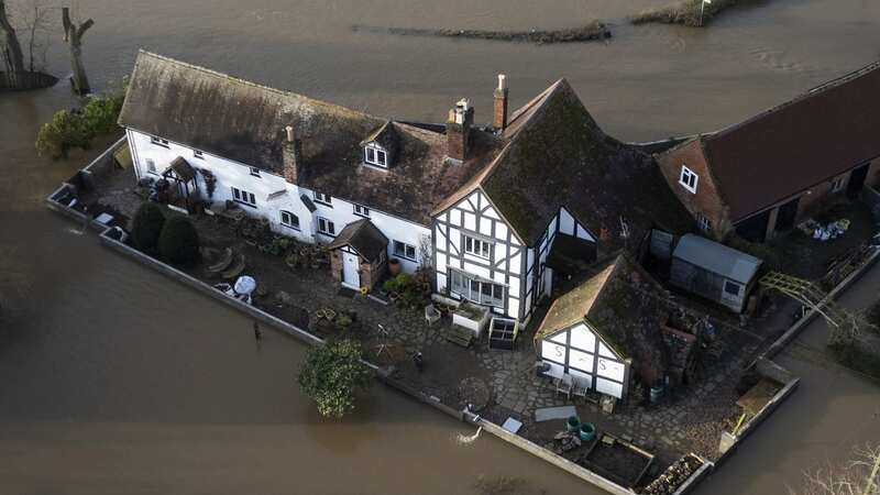 Nick Lupton, 60, and his wife Anne, 50, have fortified their home against flooding (Image: Tom Wren SWNS)