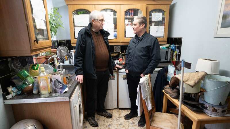 Keir Starmer meets Loughborough resident Ian Clement whose home was flooded in Storm Henk (Image: PA)