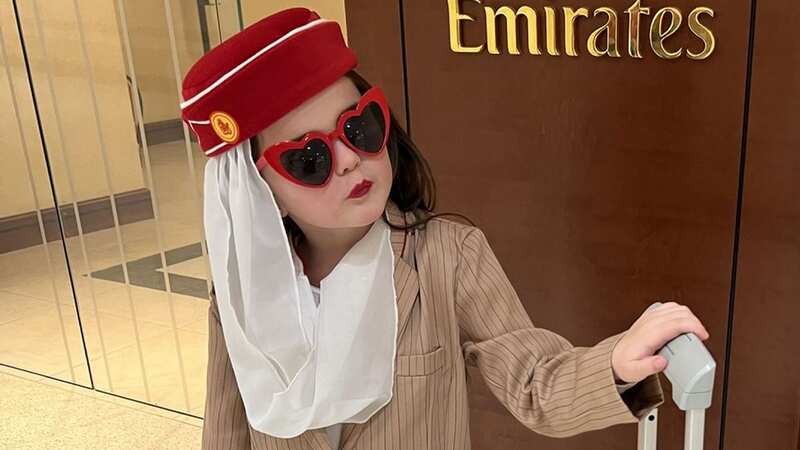 Sadie Spriggs dressed up as an Emirates flight attendant