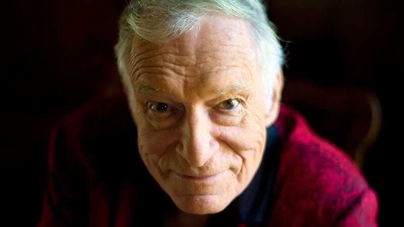 Hugh Hefner was accused of perpetrating and exploiting sexual abuse behind the glamorous gates of the Playboy Mansion (Image: Getty Images)
