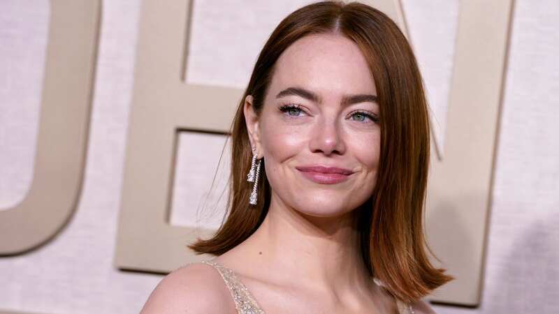 Emma Stone wore a custom-made Louis Vuitton dress and looked beautiful in full Charlotte Tilbury makeup (Image: Jordan Strauss/Invision/AP)