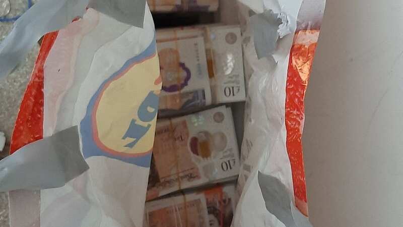 £100,000 was stashed inside a Lidl carrier bag (Image: NCA)