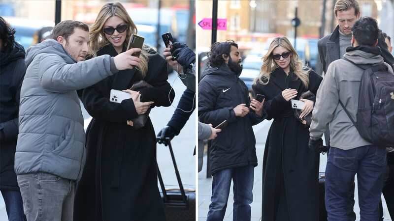 Abbey Clancy poses with fans as she arrives for birthday lunch with husband