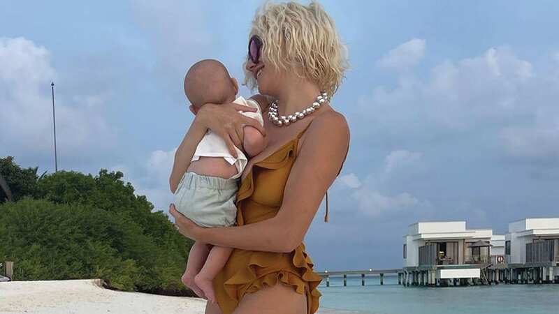 Pixie Lott looked perfect as she cradled her son Albert
