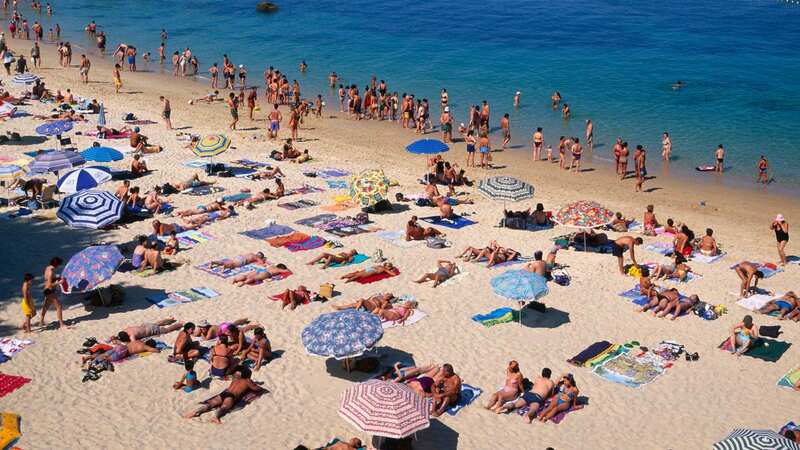 Spain has brought back some face mask rules following a rise in Covid and flu cases (Image: Getty Images)