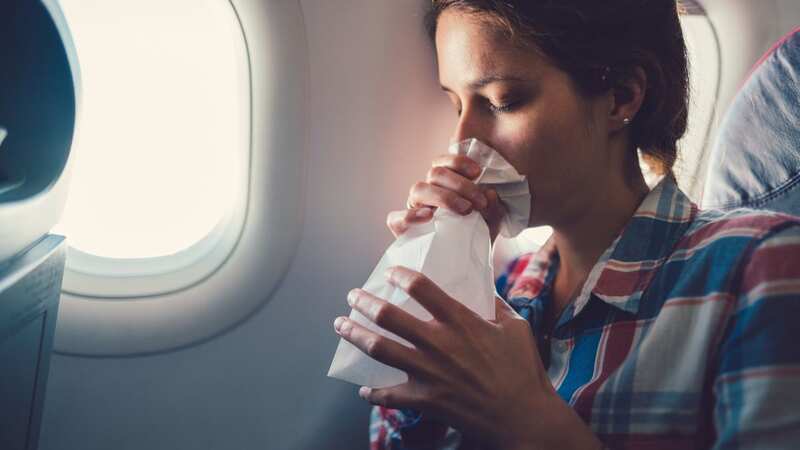 The hack finds another use for the humble sick bag (Image: Getty Images)