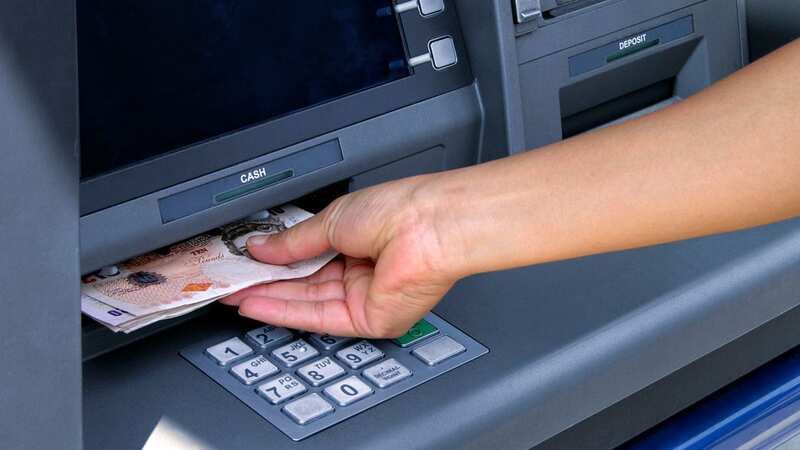 Taking out cash from ATM (Image: No credit)
