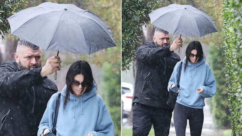 Kendall Jenner has come under fire for apparently refusing to hold her own umbrella
