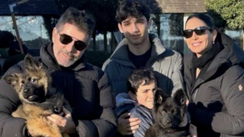 Simon Cowell poses with son Eric in sweet snap as family welcome new arrival