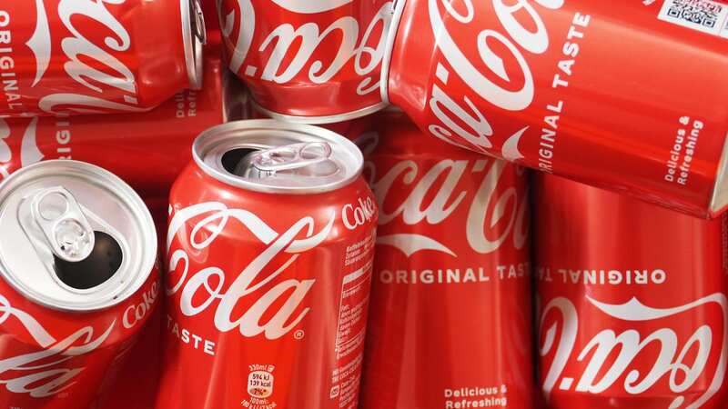 The effects of a can of Coke can be the same as heroin according to a pharmacist (Image: SOPA Images/LightRocket via Getty Images)
