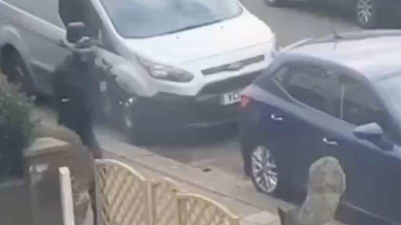 Video has circulated online of officers shooting at the dog following claims it mauled another dog to death (Image: UKNIP)