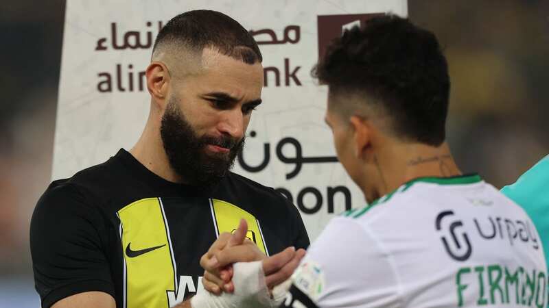 Karim Benzema and Roberto Firmino greet each other before the Saudi Pro League match between Al-Ittihad and Al-Ahli at King Abdullah Sports City (Image: 2023 Abdul Ghani Bashir Issa/MB Media)